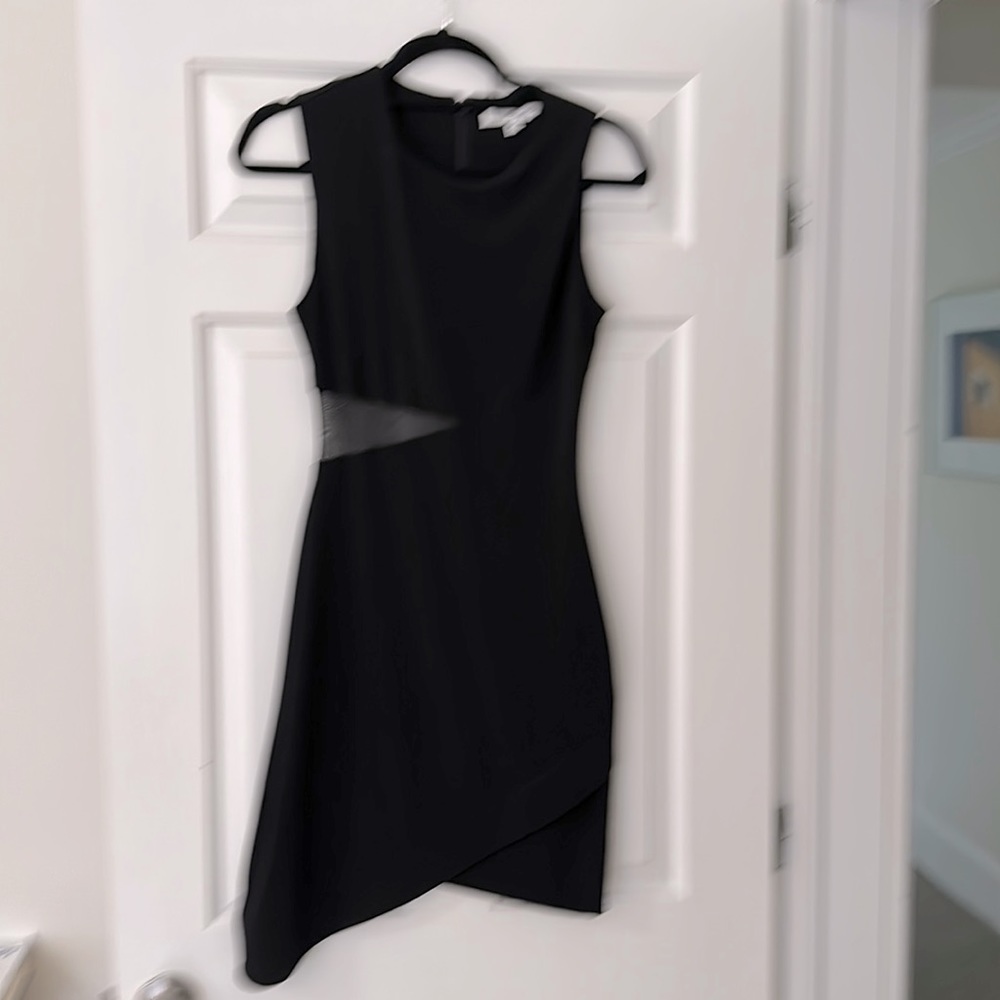 Fun and sexy Elizabeth and James black cocktail dress. Dress up her dress down.